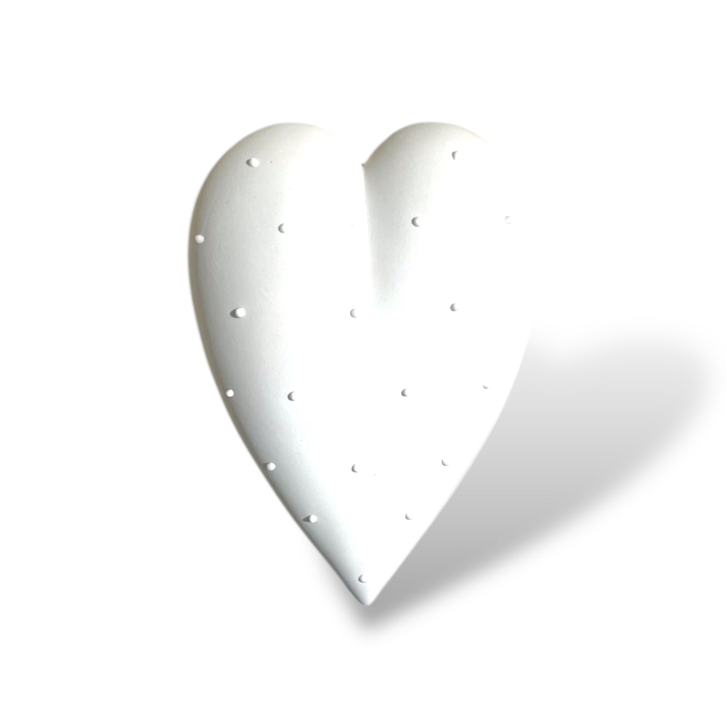 Dreamy porcelain heart with soft elegant design, romantic keepsake for anniversaries and weddings.